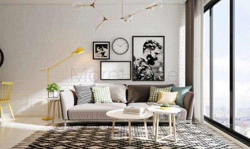 Giấy dán tường giả gạch màu trắng ấn tượng được lựa chọn tạo sự mới mẻ cho không gian thay vì sử dụng những mảng tường thô nhàm chán như những thiết kế truyền thống trước đó